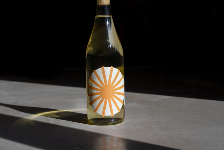 talea wine white concrete floor
